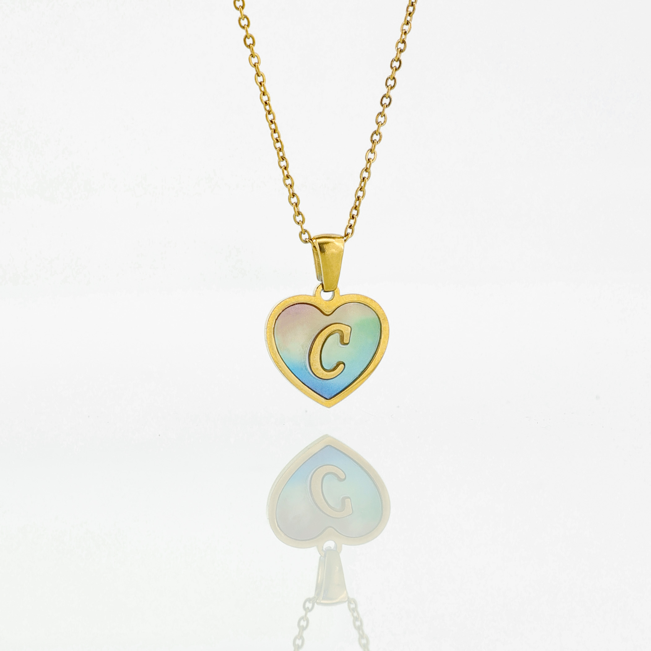 Pastel Green & Blue Initial Heart Necklace Dainty gold letter heart necklace with a mint green and ocean blue gradient enamel wing effect.