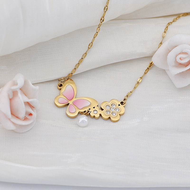 Gift Idea: Pink Butterfly Floral Pearl Necklace Pink butterfly and flower pearl necklace surrounded by roses, an ideal jewelry gift for women.